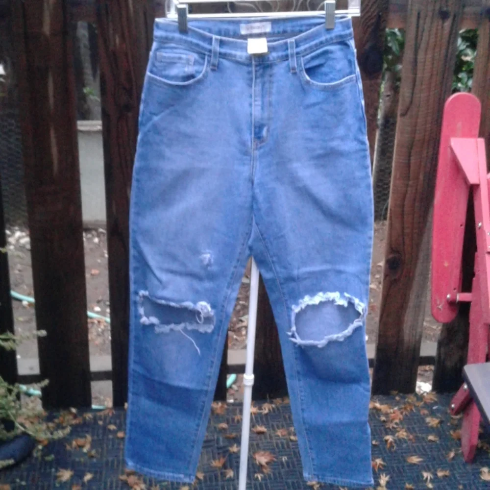 Women's jeans size 9 W 28 distressed made in the USA